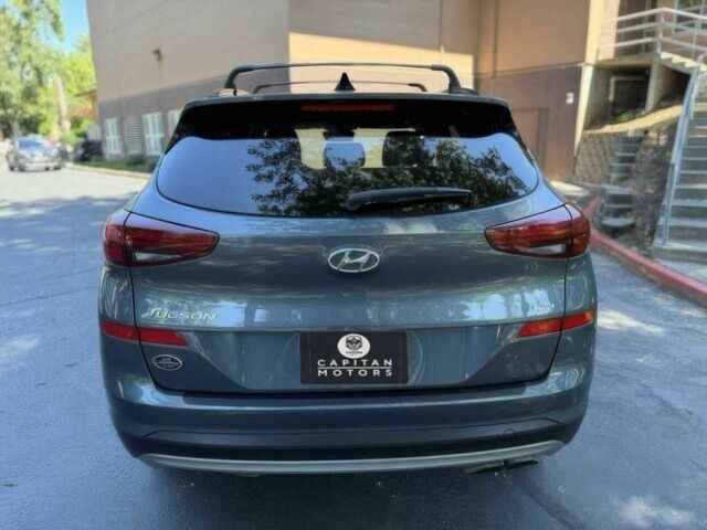 Серый Хендай Туксон, объемом двигателя 2.4 л и пробегом 23 тыс. км за 5400 $, фото 5 на Automoto.ua