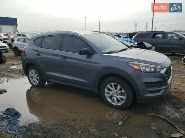 Серый Хендай Туксон, объемом двигателя 2 л и пробегом 56 тыс. км за 3000 $, фото 3 на Automoto.ua