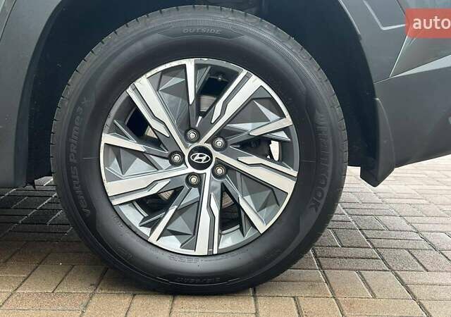 Серый Хендай Туксон, объемом двигателя 1.6 л и пробегом 100 тыс. км за 25295 $, фото 14 на Automoto.ua