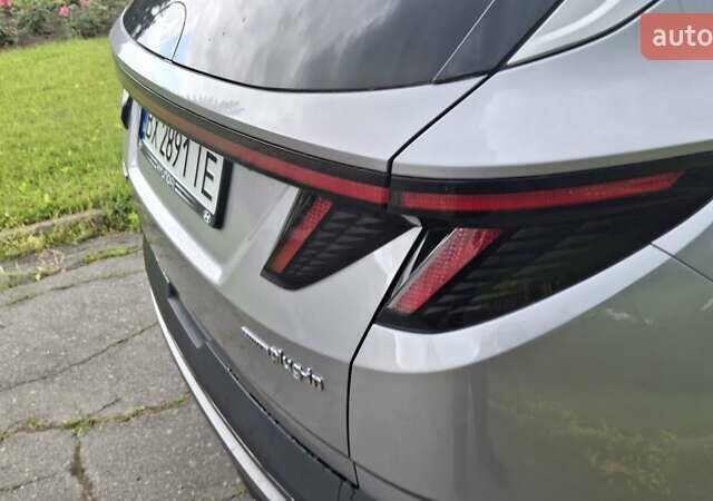 Серый Хендай Туксон, объемом двигателя 1.6 л и пробегом 77 тыс. км за 32400 $, фото 3 на Automoto.ua