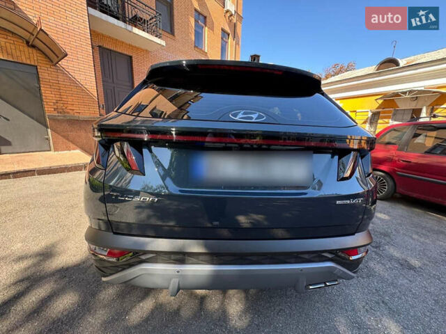 Серый Хендай Туксон, объемом двигателя 1.6 л и пробегом 53 тыс. км за 37000 $, фото 3 на Automoto.ua