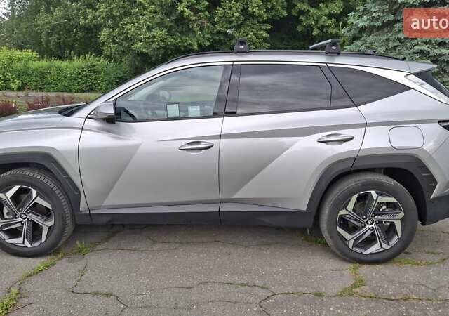 Серый Хендай Туксон, объемом двигателя 1.6 л и пробегом 77 тыс. км за 32400 $, фото 11 на Automoto.ua