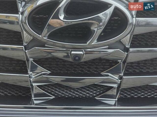 Серый Хендай Туксон, объемом двигателя 2 л и пробегом 39 тыс. км за 30500 $, фото 3 на Automoto.ua