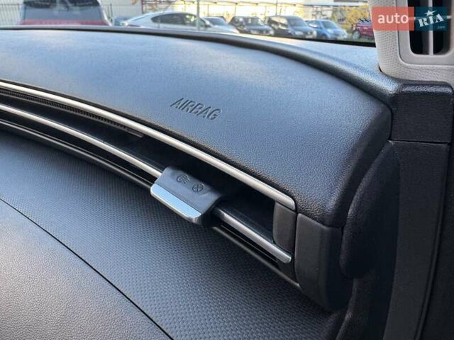 Серый Хендай Туксон, объемом двигателя 2 л и пробегом 37 тыс. км за 25000 $, фото 47 на Automoto.ua