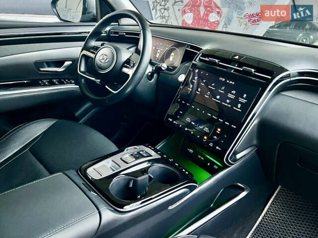 Серый Хендай Туксон, объемом двигателя 1.6 л и пробегом 51 тыс. км за 36300 $, фото 5 на Automoto.ua