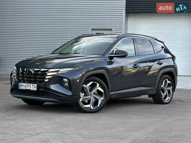 Серый Хендай Туксон, объемом двигателя 1.6 л и пробегом 95 тыс. км за 29900 $, фото 5 на Automoto.ua