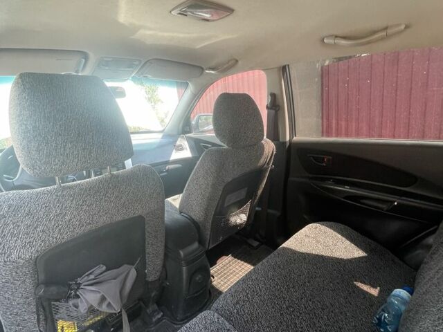 Серый Хендай Туксон, объемом двигателя 2 л и пробегом 250 тыс. км за 5800 $, фото 8 на Automoto.ua