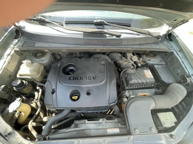 Серый Хендай Туксон, объемом двигателя 2 л и пробегом 250 тыс. км за 5800 $, фото 4 на Automoto.ua