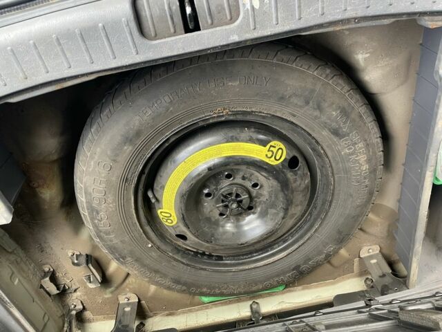 Синий Хендай Туксон, объемом двигателя 2 л и пробегом 271 тыс. км за 4200 $, фото 10 на Automoto.ua