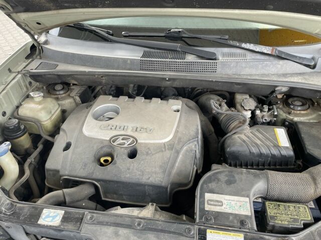 Синий Хендай Туксон, объемом двигателя 2 л и пробегом 271 тыс. км за 4200 $, фото 15 на Automoto.ua