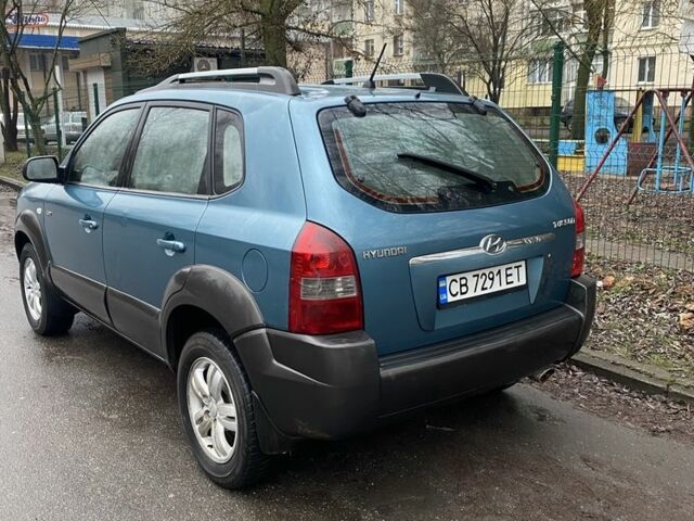 Синий Хендай Туксон, объемом двигателя 2 л и пробегом 220 тыс. км за 6600 $, фото 1 на Automoto.ua