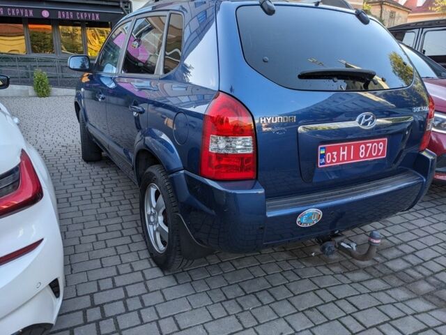 Синий Хендай Туксон, объемом двигателя 2 л и пробегом 195 тыс. км за 7300 $, фото 2 на Automoto.ua