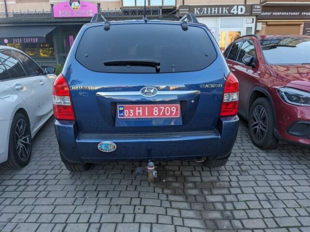 Синий Хендай Туксон, объемом двигателя 2 л и пробегом 195 тыс. км за 7300 $, фото 3 на Automoto.ua