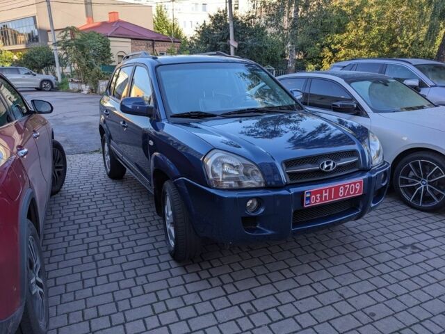 Синий Хендай Туксон, объемом двигателя 2 л и пробегом 195 тыс. км за 7300 $, фото 1 на Automoto.ua