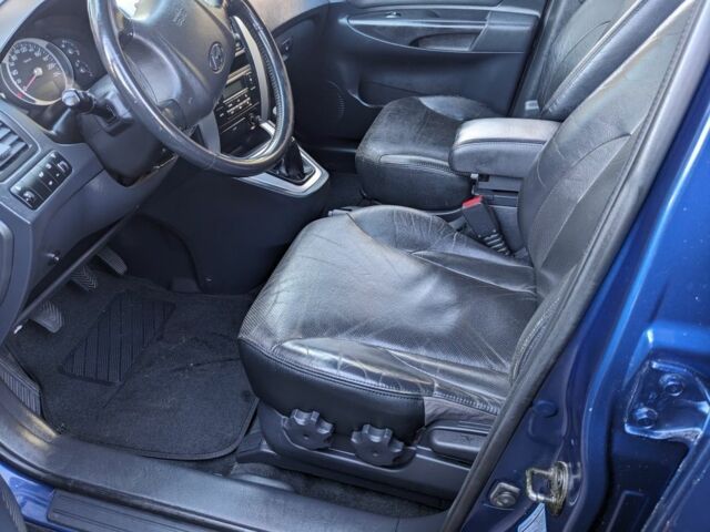 Синий Хендай Туксон, объемом двигателя 2 л и пробегом 195 тыс. км за 7300 $, фото 4 на Automoto.ua