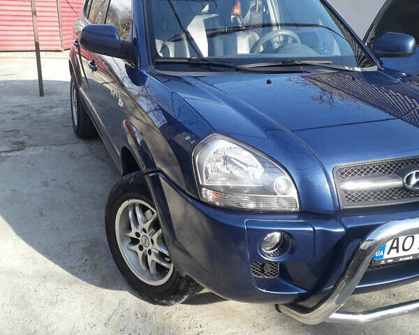 Синий Хендай Туксон, объемом двигателя 2 л и пробегом 223 тыс. км за 7700 $, фото 8 на Automoto.ua