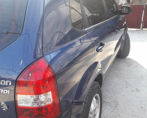 Синий Хендай Туксон, объемом двигателя 2 л и пробегом 223 тыс. км за 7700 $, фото 12 на Automoto.ua