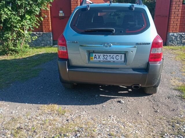 Синий Хендай Туксон, объемом двигателя 2 л и пробегом 266 тыс. км за 7000 $, фото 2 на Automoto.ua