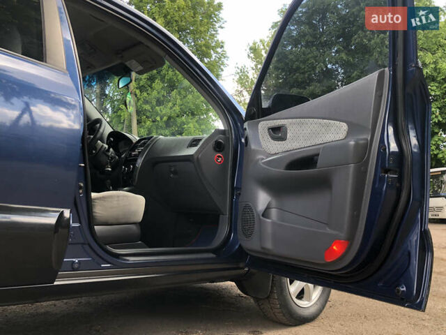 Синій Хендай Туксон, об'ємом двигуна 1.99 л та пробігом 315 тис. км за 6700 $, фото 14 на Automoto.ua