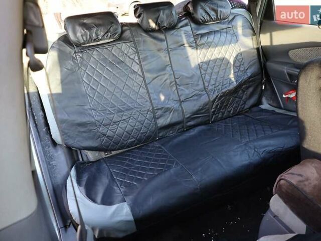 Синий Хендай Туксон, объемом двигателя 1.98 л и пробегом 280 тыс. км за 4800 $, фото 10 на Automoto.ua