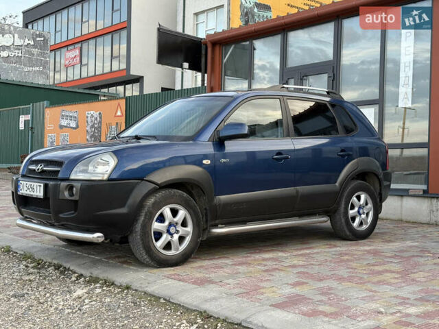 Синій Хендай Туксон, об'ємом двигуна 1.99 л та пробігом 299 тис. км за 7200 $, фото 4 на Automoto.ua