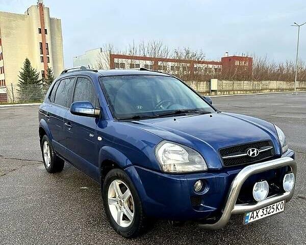 Синий Хендай Туксон, объемом двигателя 2 л и пробегом 224 тыс. км за 8300 $, фото 1 на Automoto.ua