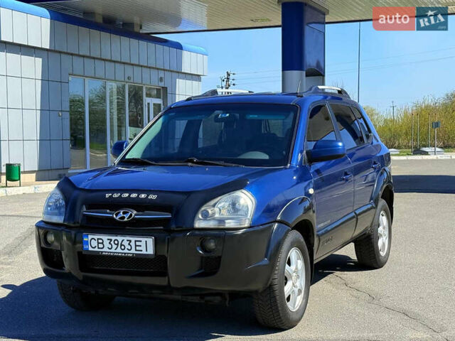 Синий Хендай Туксон, объемом двигателя 2 л и пробегом 320 тыс. км за 6300 $, фото 10 на Automoto.ua