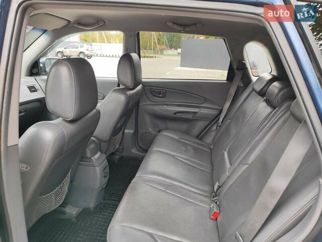 Синий Хендай Туксон, объемом двигателя 1.99 л и пробегом 225 тыс. км за 8000 $, фото 12 на Automoto.ua