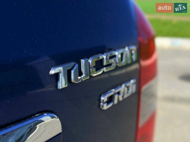 Синий Хендай Туксон, объемом двигателя 2 л и пробегом 320 тыс. км за 6300 $, фото 4 на Automoto.ua