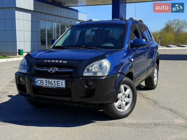 Синий Хендай Туксон, объемом двигателя 2 л и пробегом 320 тыс. км за 6300 $, фото 1 на Automoto.ua