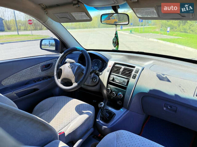 Синий Хендай Туксон, объемом двигателя 2 л и пробегом 320 тыс. км за 6300 $, фото 15 на Automoto.ua