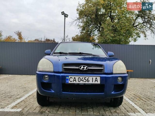 Синий Хендай Туксон, объемом двигателя 1.99 л и пробегом 225 тыс. км за 8000 $, фото 2 на Automoto.ua