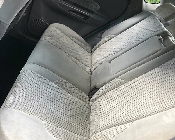 Синий Хендай Туксон, объемом двигателя 1.99 л и пробегом 315 тыс. км за 6700 $, фото 12 на Automoto.ua