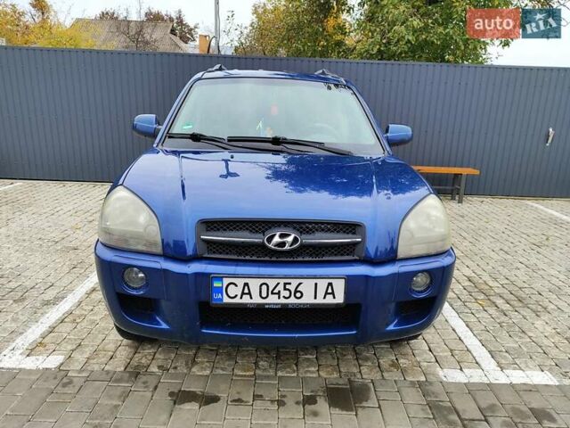 Синий Хендай Туксон, объемом двигателя 1.99 л и пробегом 225 тыс. км за 8000 $, фото 1 на Automoto.ua