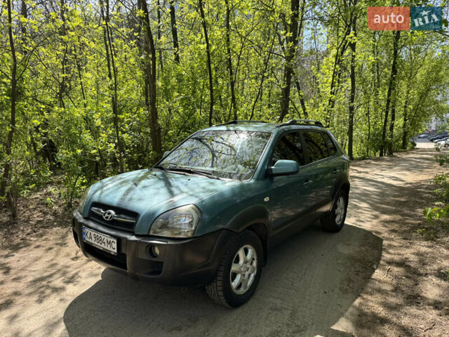 Синий Хендай Туксон, объемом двигателя 1.99 л и пробегом 272 тыс. км за 6800 $, фото 3 на Automoto.ua