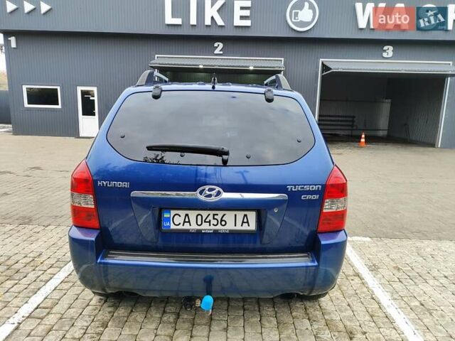 Синий Хендай Туксон, объемом двигателя 1.99 л и пробегом 225 тыс. км за 8000 $, фото 19 на Automoto.ua