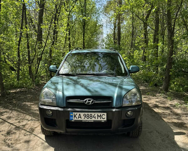 Синий Хендай Туксон, объемом двигателя 1.99 л и пробегом 272 тыс. км за 6800 $, фото 2 на Automoto.ua