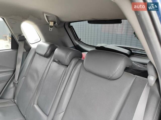 Синий Хендай Туксон, объемом двигателя 1.99 л и пробегом 225 тыс. км за 8000 $, фото 13 на Automoto.ua