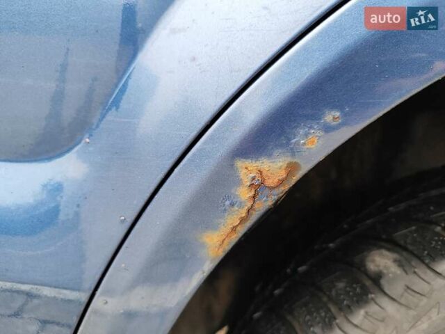Синий Хендай Туксон, объемом двигателя 1.99 л и пробегом 225 тыс. км за 8000 $, фото 23 на Automoto.ua