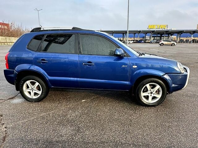 Синий Хендай Туксон, объемом двигателя 2 л и пробегом 224 тыс. км за 8300 $, фото 1 на Automoto.ua