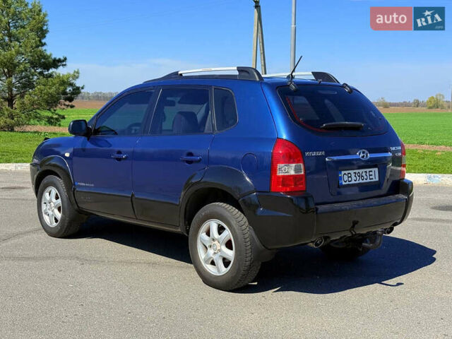 Синий Хендай Туксон, объемом двигателя 2 л и пробегом 320 тыс. км за 6300 $, фото 11 на Automoto.ua