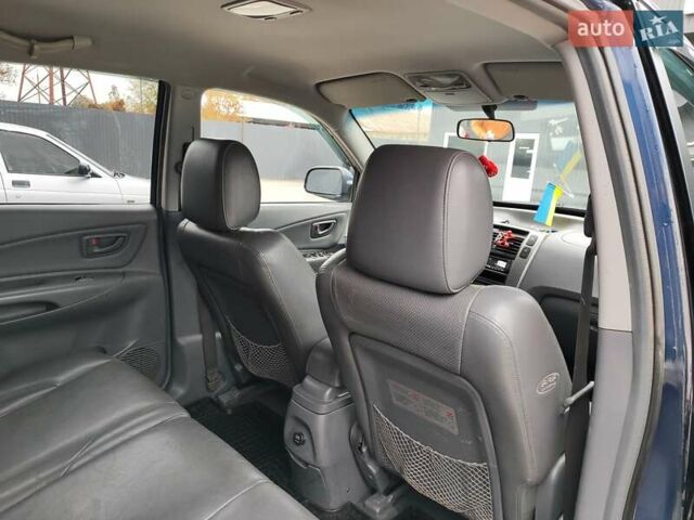 Синий Хендай Туксон, объемом двигателя 1.99 л и пробегом 225 тыс. км за 8000 $, фото 17 на Automoto.ua