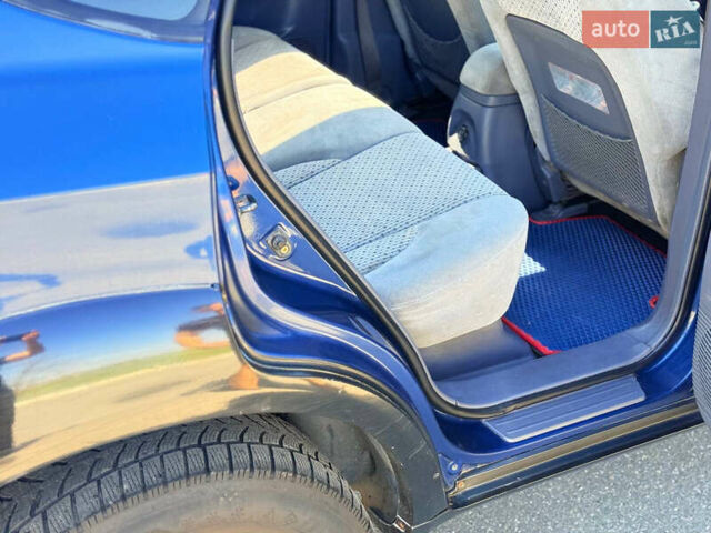 Синий Хендай Туксон, объемом двигателя 2 л и пробегом 320 тыс. км за 6300 $, фото 16 на Automoto.ua