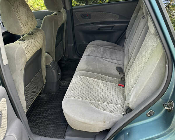 Синий Хендай Туксон, объемом двигателя 1.99 л и пробегом 272 тыс. км за 6800 $, фото 17 на Automoto.ua
