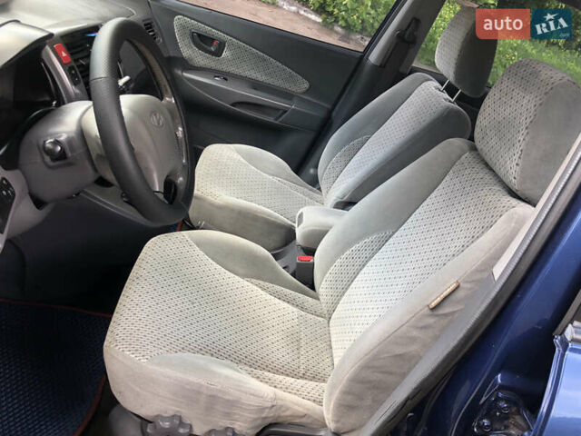 Синий Хендай Туксон, объемом двигателя 1.99 л и пробегом 315 тыс. км за 6700 $, фото 10 на Automoto.ua