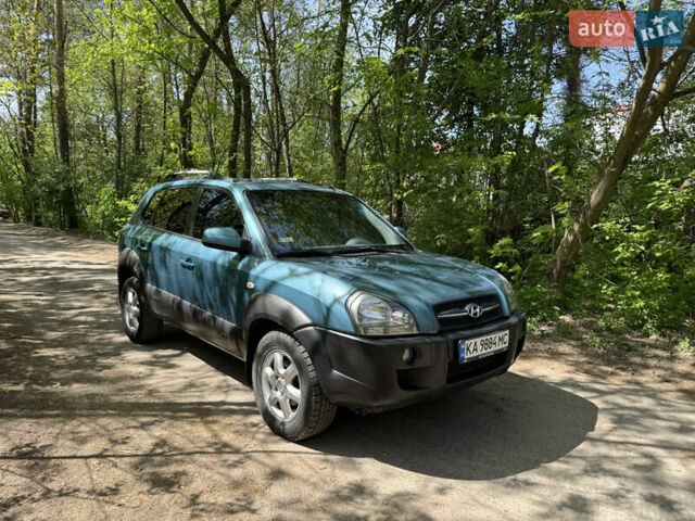 Синий Хендай Туксон, объемом двигателя 1.99 л и пробегом 272 тыс. км за 6800 $, фото 1 на Automoto.ua