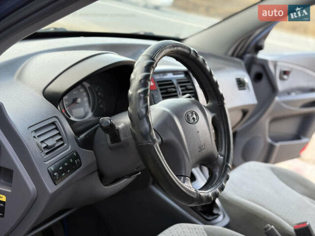 Синій Хендай Туксон, об'ємом двигуна 1.99 л та пробігом 299 тис. км за 7200 $, фото 28 на Automoto.ua