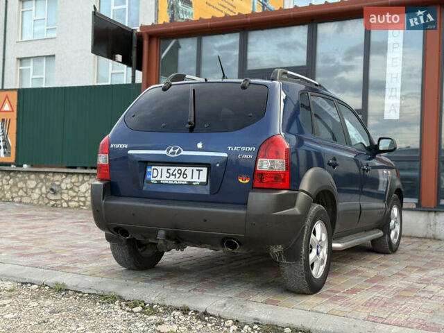 Синій Хендай Туксон, об'ємом двигуна 1.99 л та пробігом 299 тис. км за 7200 $, фото 26 на Automoto.ua