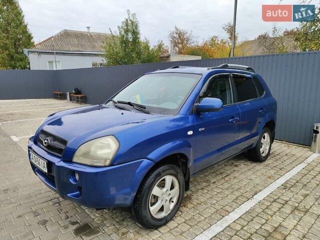 Синий Хендай Туксон, объемом двигателя 1.99 л и пробегом 225 тыс. км за 8000 $, фото 7 на Automoto.ua