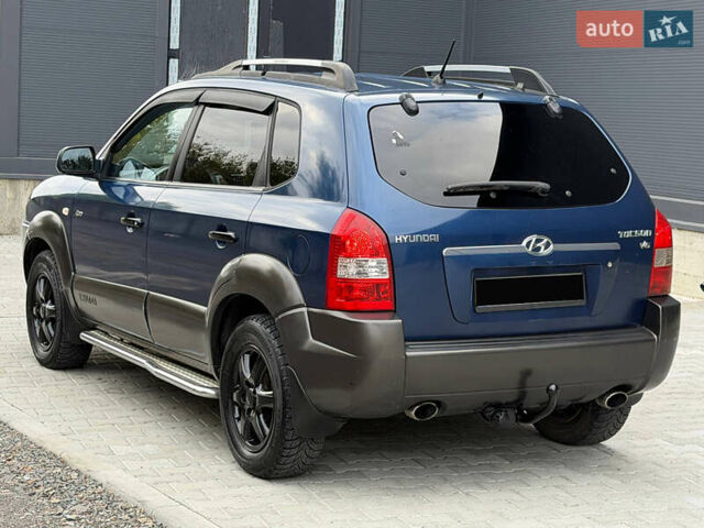 Синий Хендай Туксон, объемом двигателя 2.66 л и пробегом 320 тыс. км за 6300 $, фото 1 на Automoto.ua
